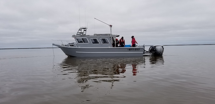 Figure 6. UTEP&#39;s Aliuq research vessel and PI&#39;s and students from UTEP and UTMSI conducting research in Elson Lagoon as part of the BLE-LTER. Photo courtesy of Craig Tweedie.